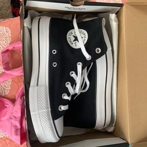 Platform Chuck Taylors size 7. Brand New. Never worn.
